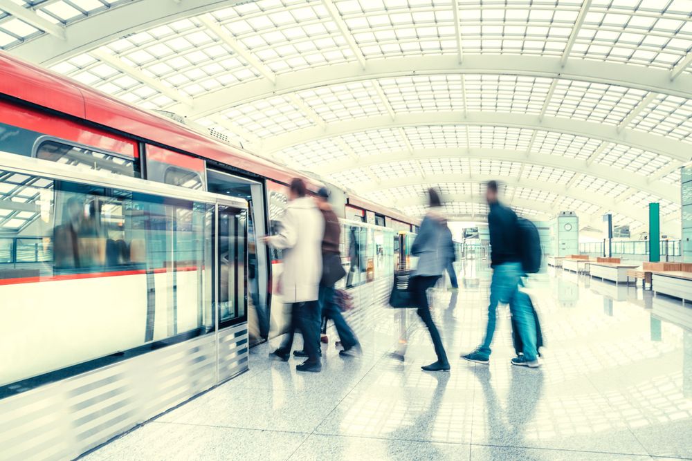 crowd-boarding-train-subway-platform-getty-511365374.jpg