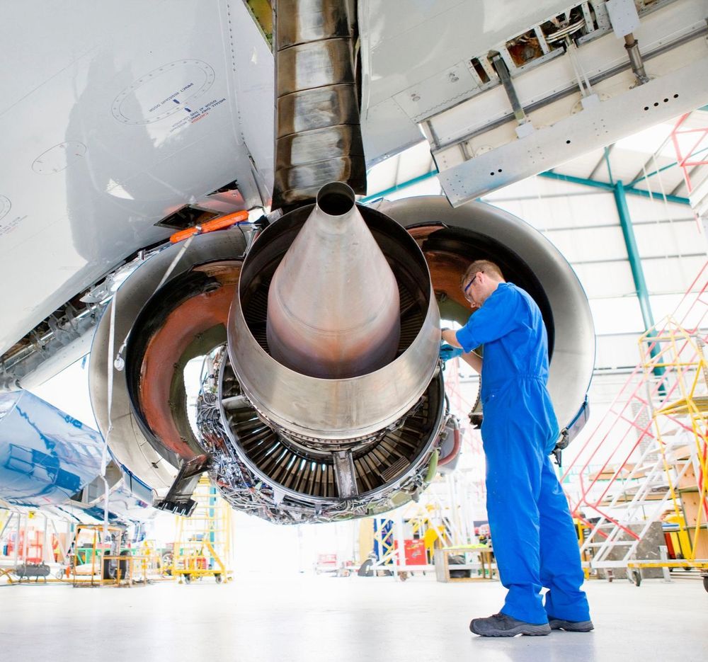 engineer-working-wings-of-passenger-jet-hangar-getty-482175029-150DPI.jpg